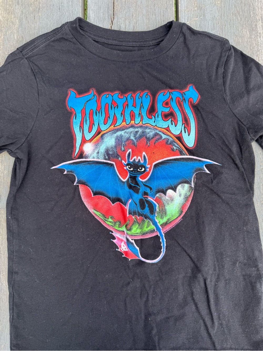 Black Kids Toothless Graphic Tee with Blue and Red Art